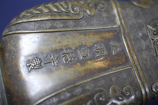 A Chinese archaistic bronze vessel, fanghu, Xuande mark but 17th/18th century, height 15.3cm